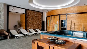 Sauna, hot tub, steam room, hot stone massages, sports massages