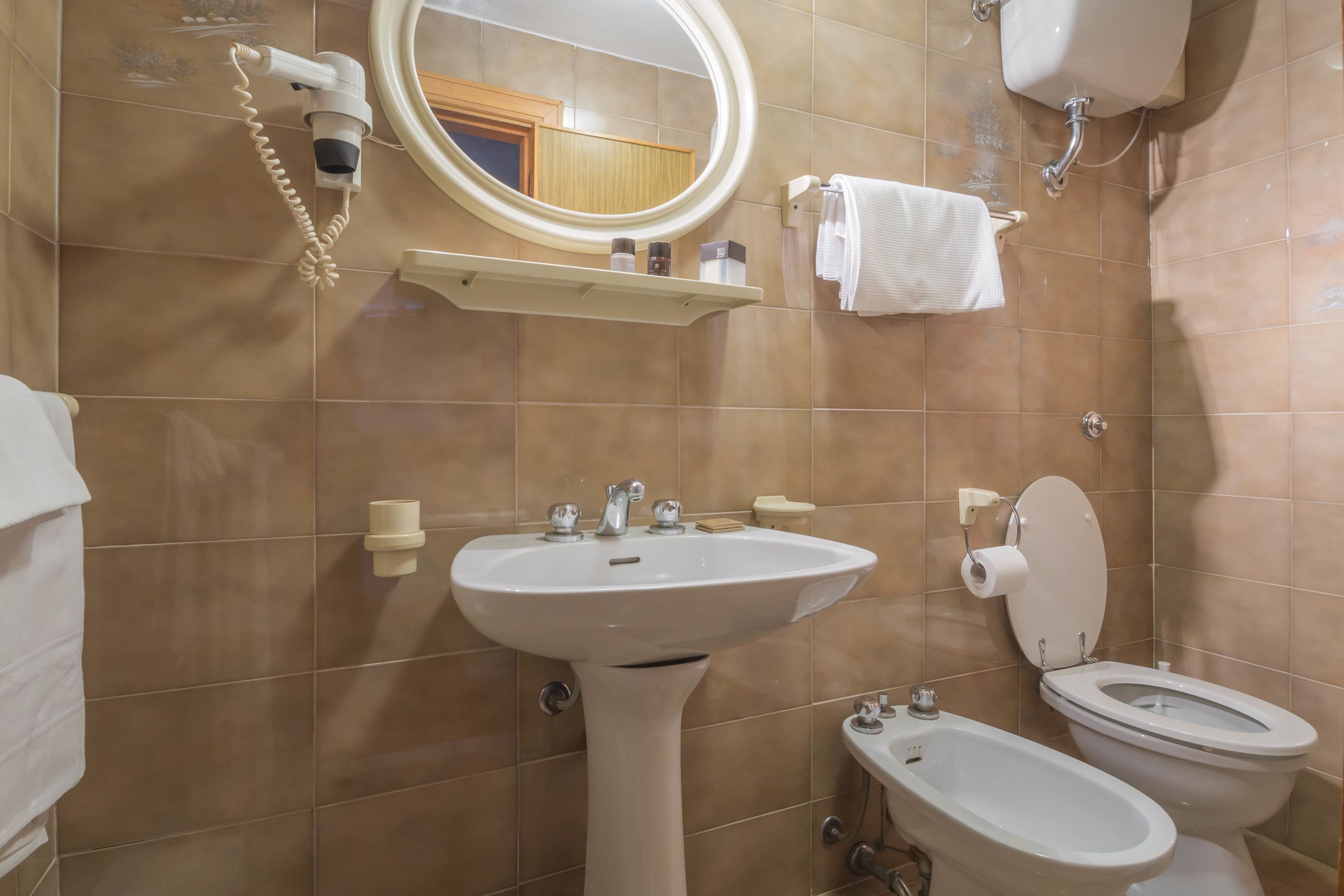 deep-soaking bathtub, free toiletries, hair dryer, bidet