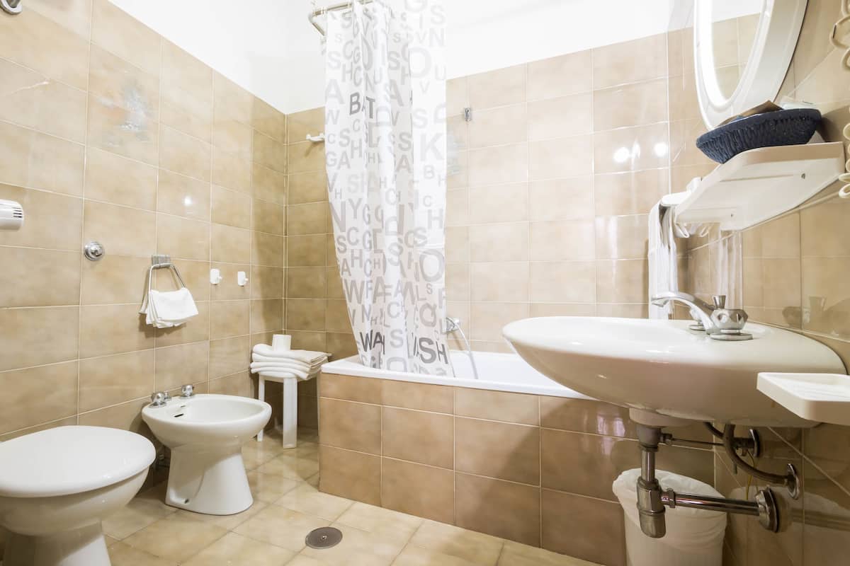 quadruple room | bathroom | deep-soaking bathtub, free toiletries, hair dryer, bidet