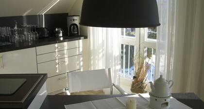 Am Sieltief gelegene (Bootssteg, Angler...)helle Maisonette - Ferienwohnung