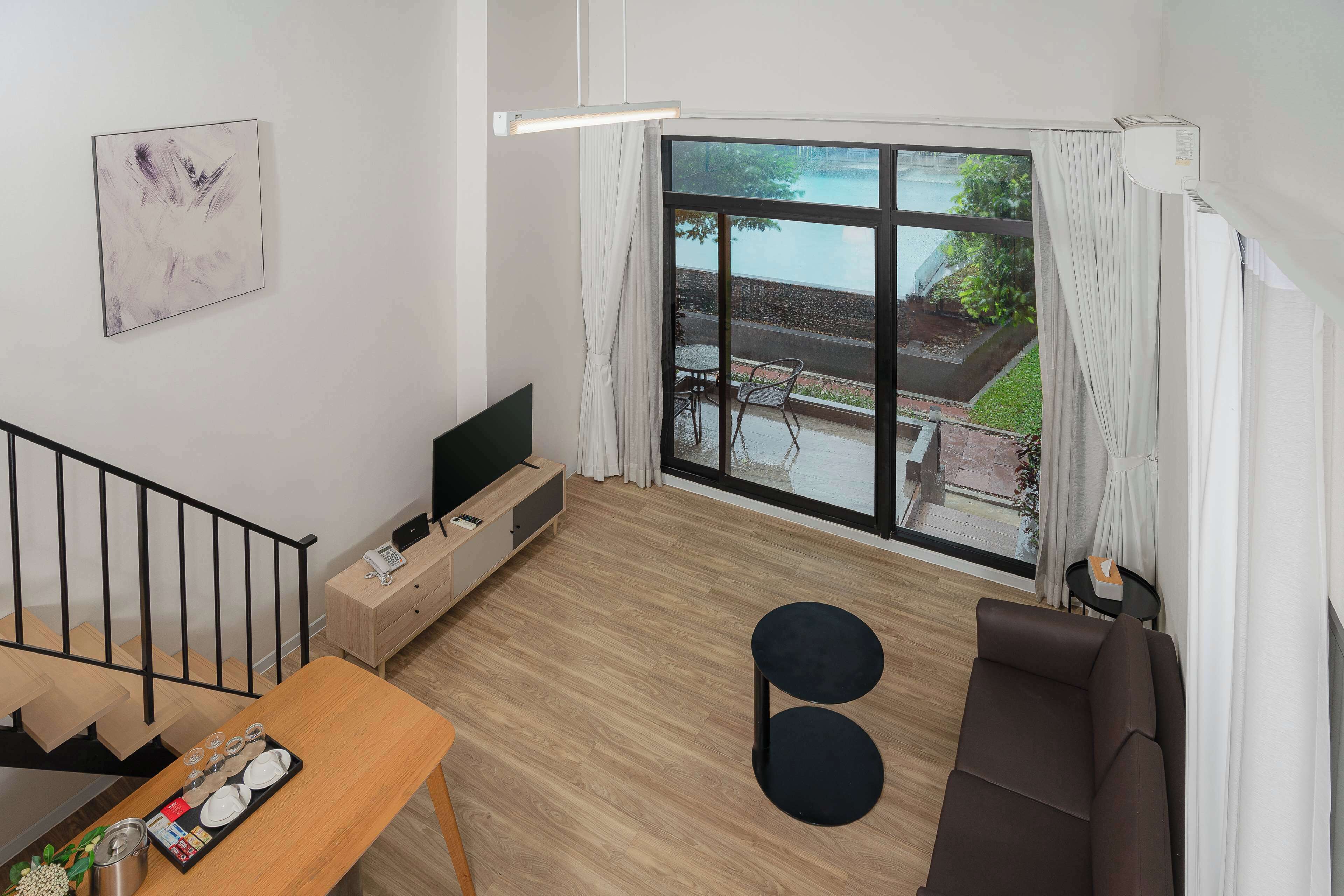 Suite Deluxe, plusieurs lits, non-fumeur, en bord de piscine (Living Room) | Vue de la chambre