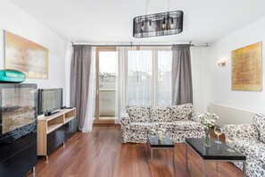 Leilighet – business | Oppholdsrom | En 32-tommers Flatskjerm-TV med kabel-kanaler samt TV