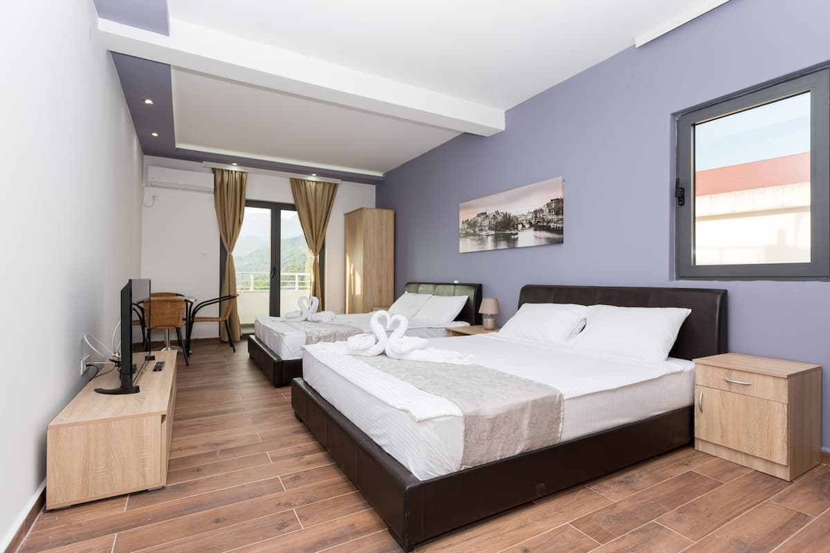 Appartement Classique, 2 grands lits, non-fumeurs | 1 chambre, chambres insonorisées, fer et planche à repasser