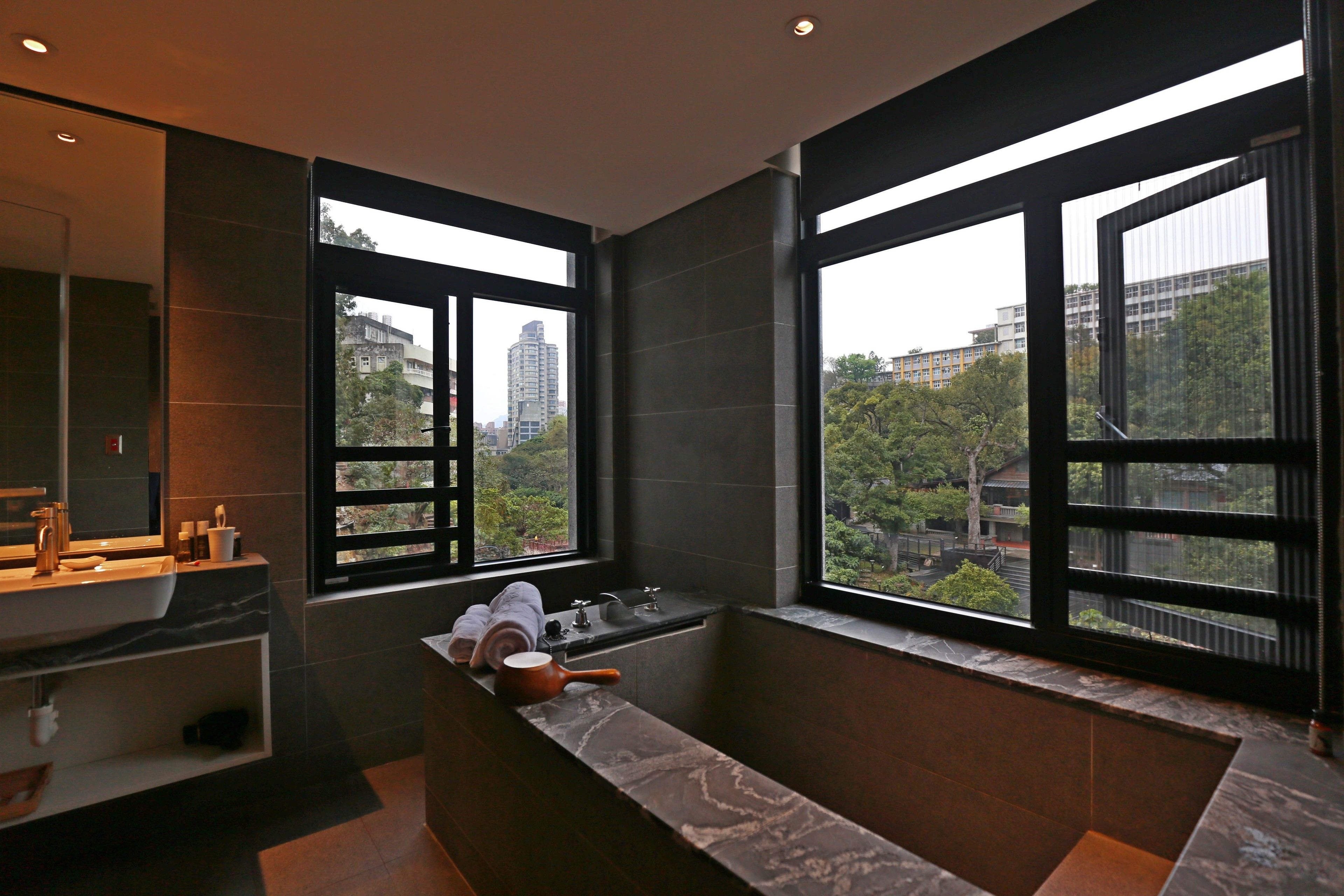 deluxe double room, park view | bathroom | separate bathtub and shower, spring water bathtub, rainfall showerhead