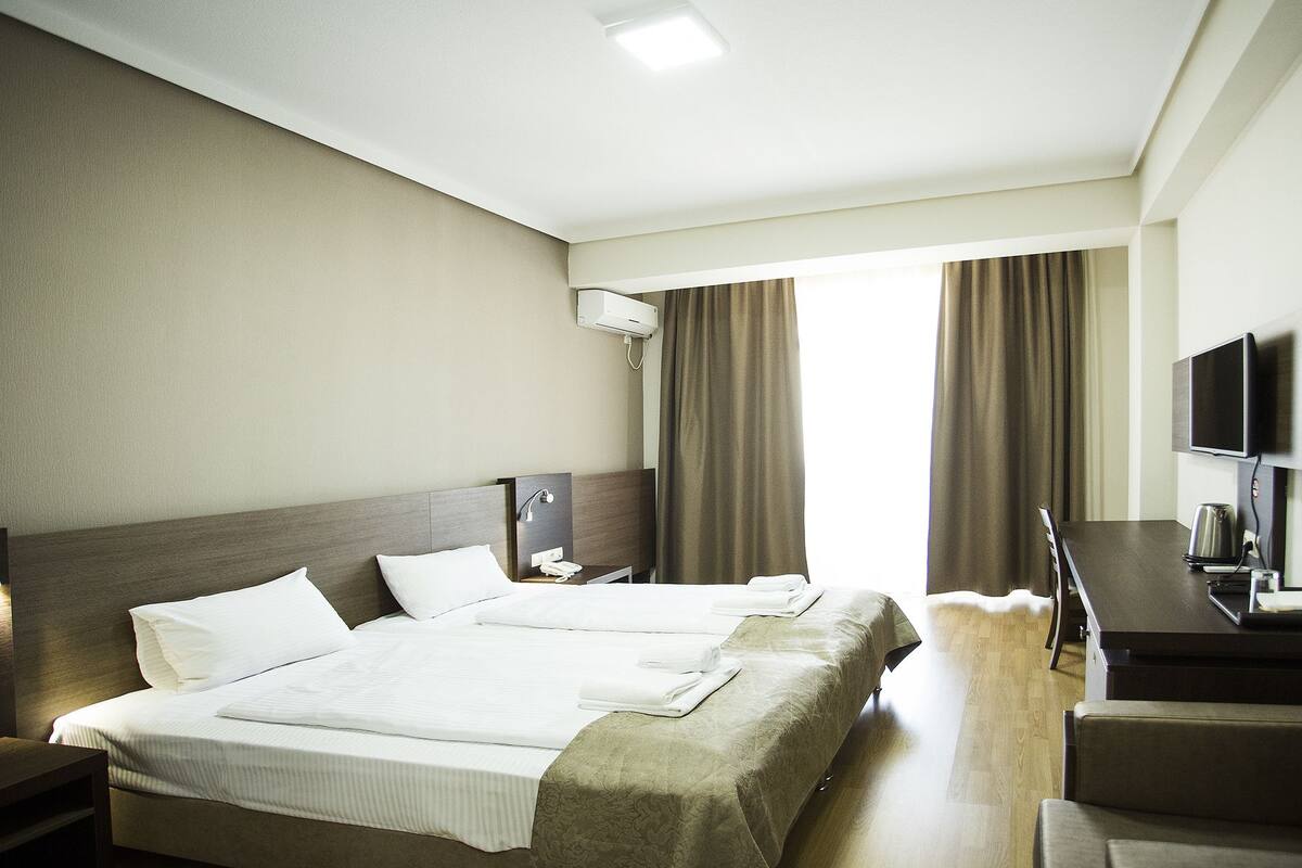 Chambre simple Deluxe | Coffre-fort, bureau, rideaux d’obscurcissement, système d’insonorisation