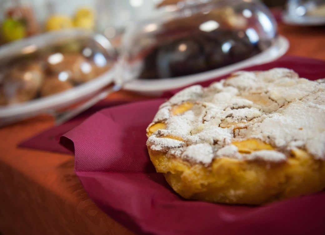 A pastry on a red napkin.