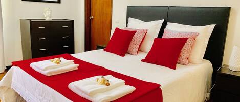 Nicely decorated double bed in the city of Funchal
