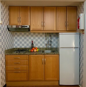 Fridge, microwave, coffee/tea maker, electric kettle