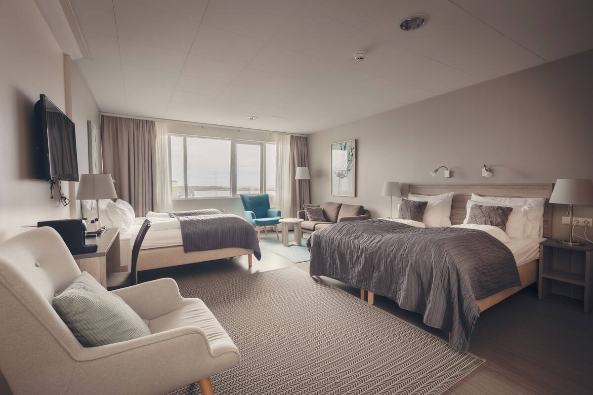 quadruple room, private bathroom | 1 bedroom, desk, blackout curtains, soundproofing