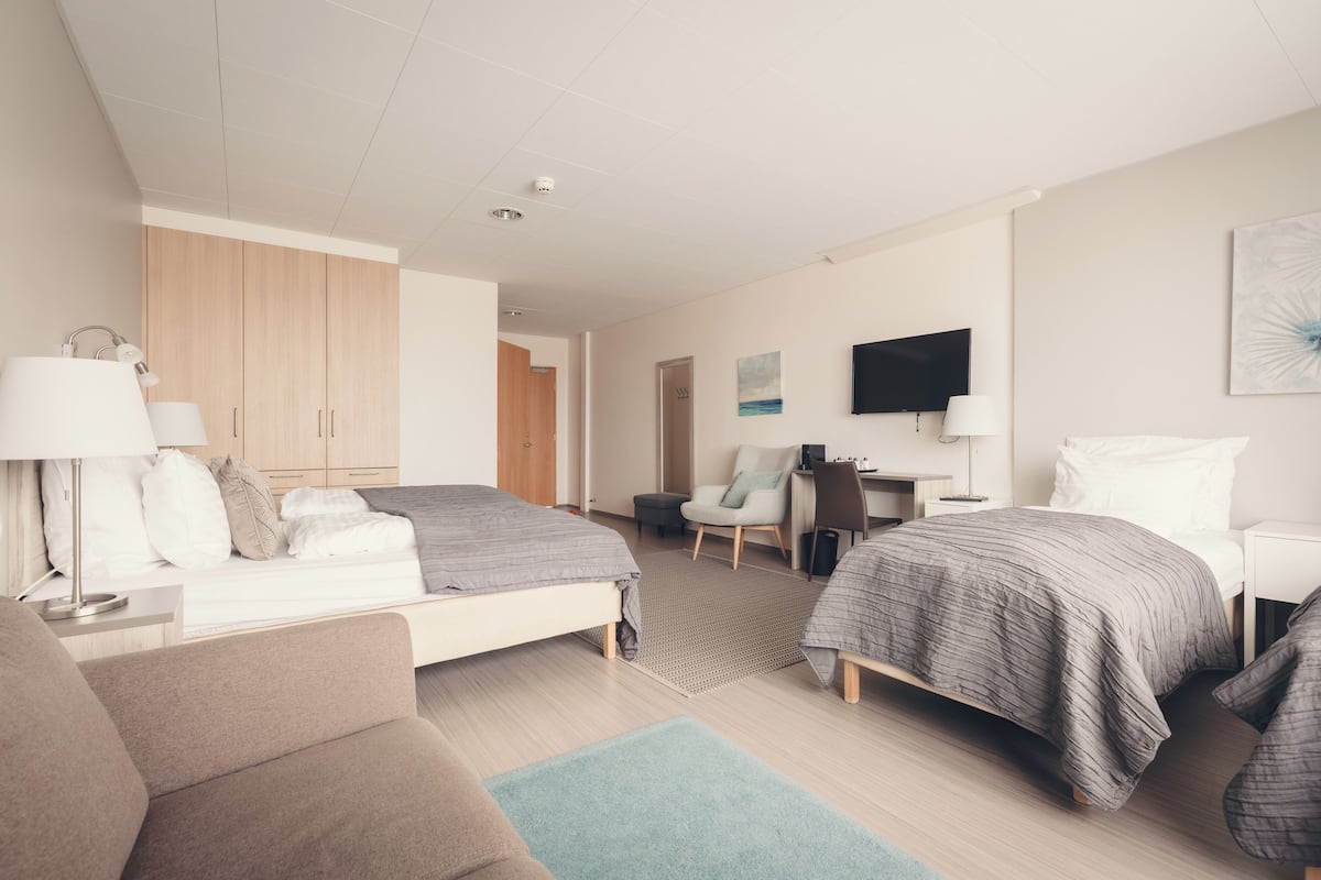 quadruple room, private bathroom | 1 bedroom, desk, blackout curtains, soundproofing