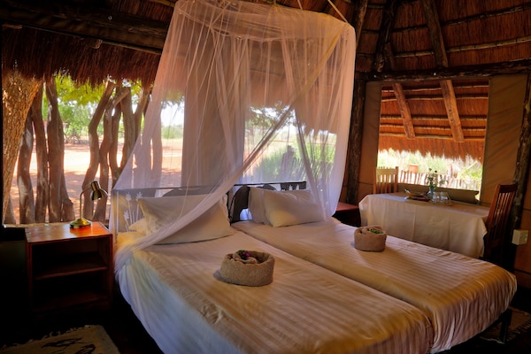 Luxury Tent | In-room safe, desk, blackout drapes, rollaway beds
