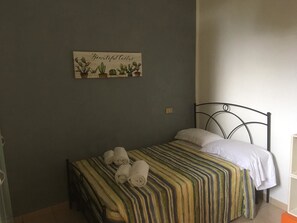 Apartment, 1 Bedroom | 1 bedroom, cribs/infant beds, bed sheets - Sapienza Time (Siena)