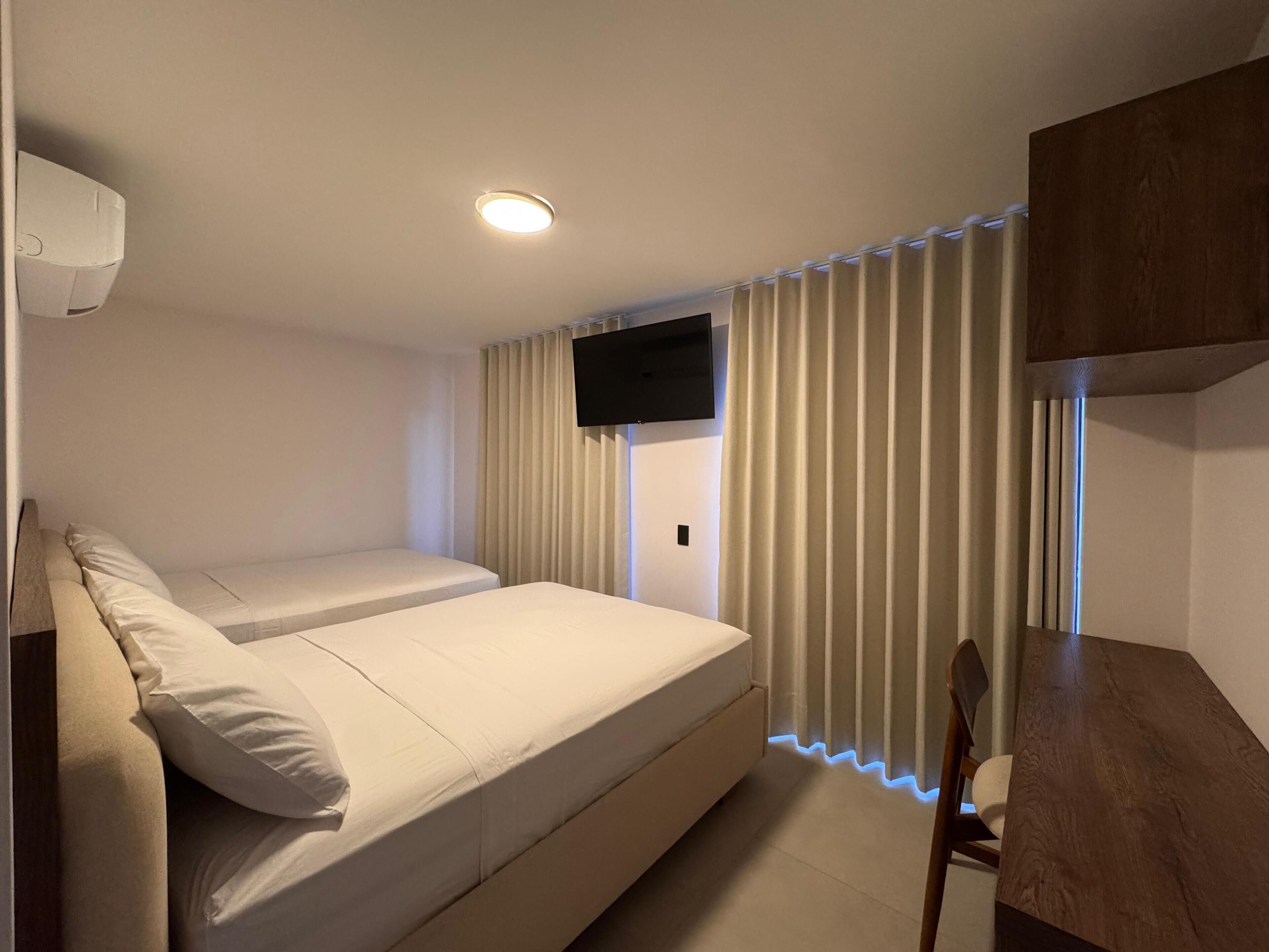 Economy Triple Room, 2 Double Beds, Non Smoking | Egyptian cotton sheets, premium bedding, down duvets