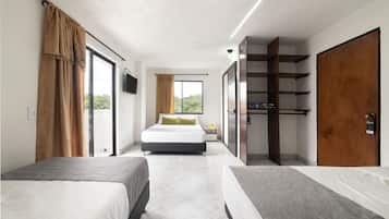 Family Room, Multiple Beds, Non Smoking | Blackout curtains, free WiFi, bed sheets