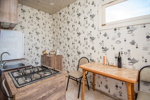 Fridge, coffee/tea maker, paper towels