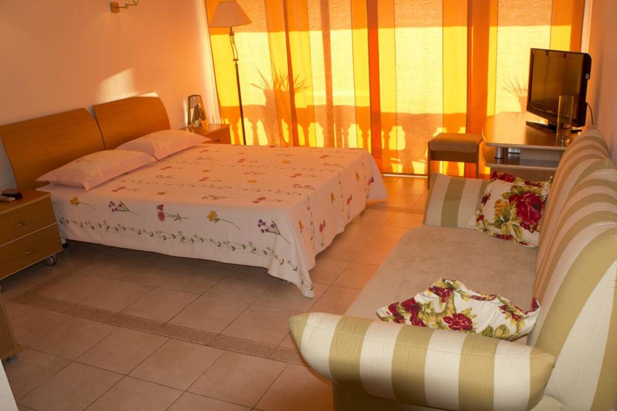 Deluxe Triple Room, Balcony, Sea View | In-room safe, desk, iron/ironing board, free WiFi