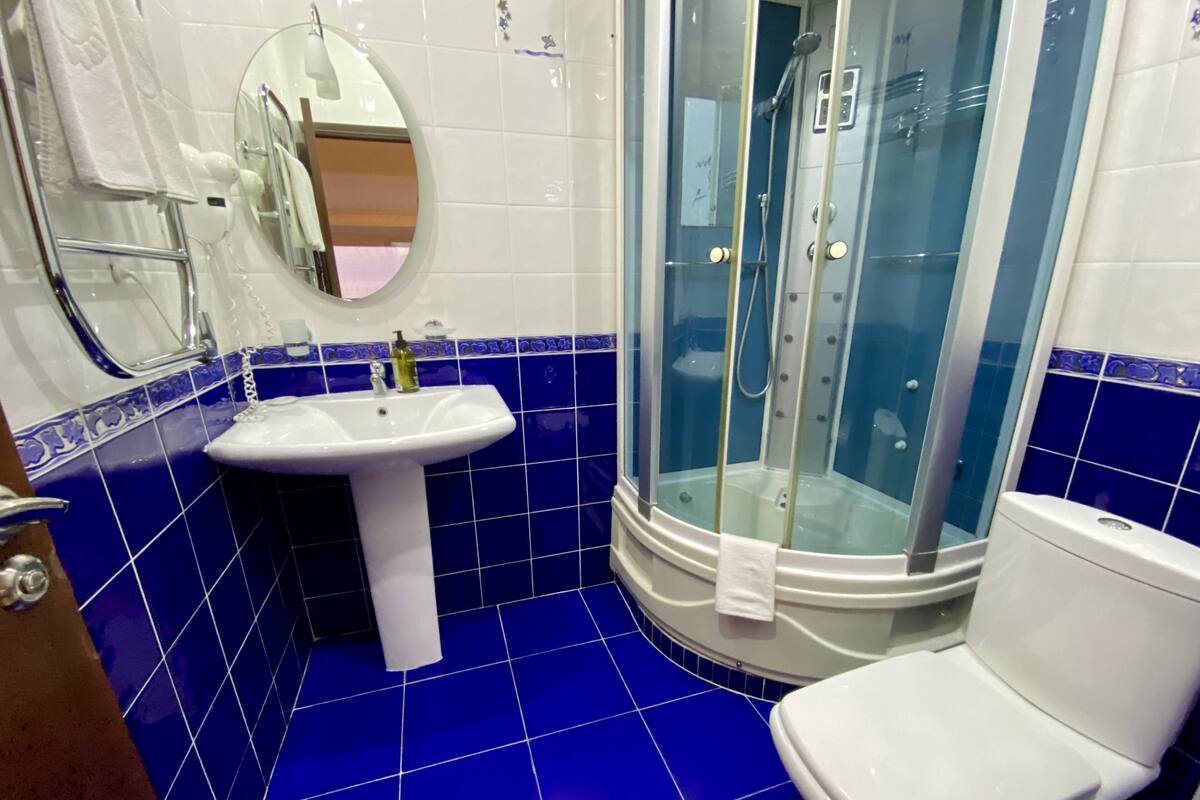 Deluxe Triple Room, Sea View | In-room safe, desk, iron/ironing board, free WiFi