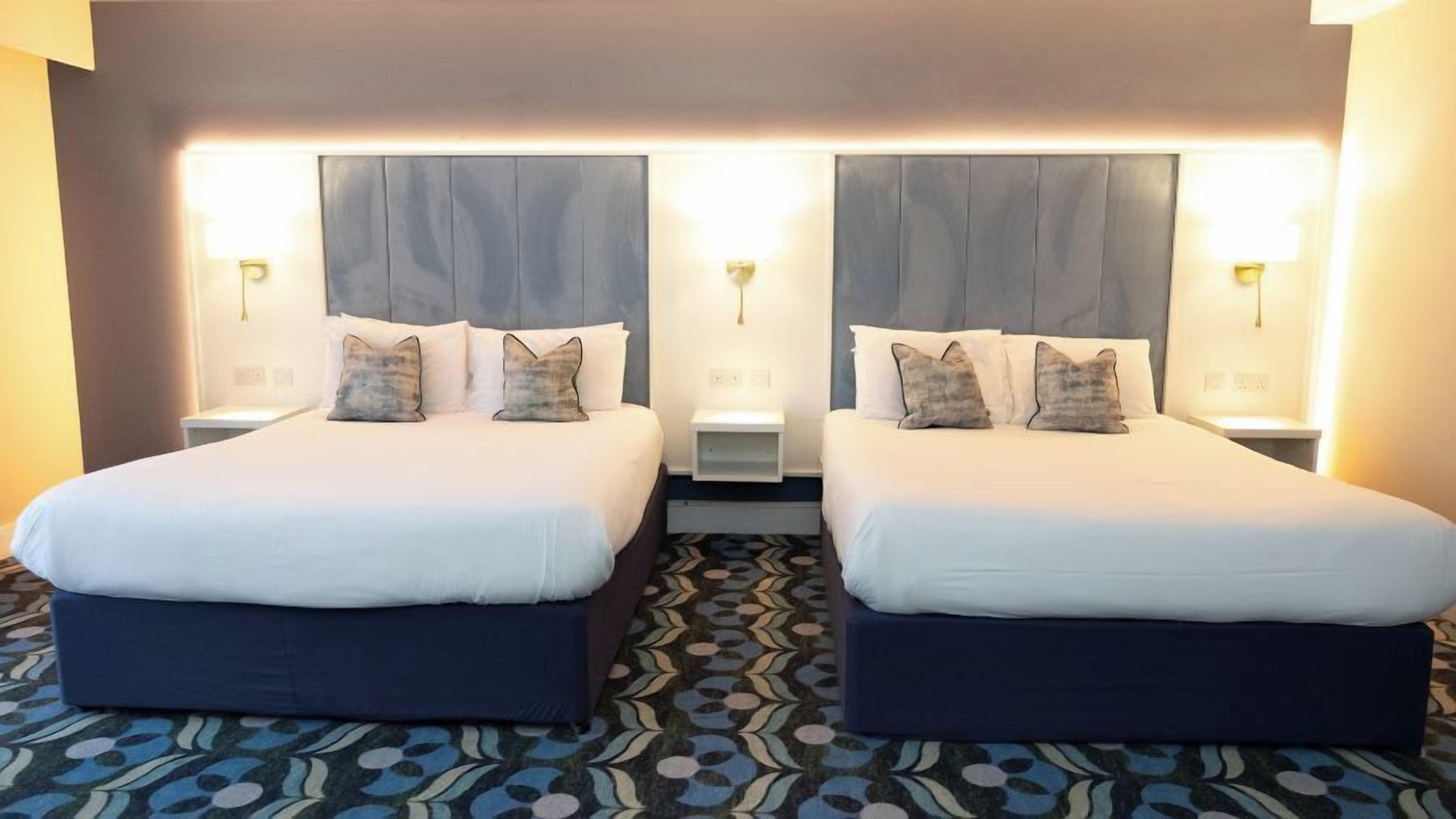 family room | 1 bedroom, in-room safe, individually decorated, individually furnished