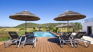 Outdoor pool, pool umbrellas, pool loungers