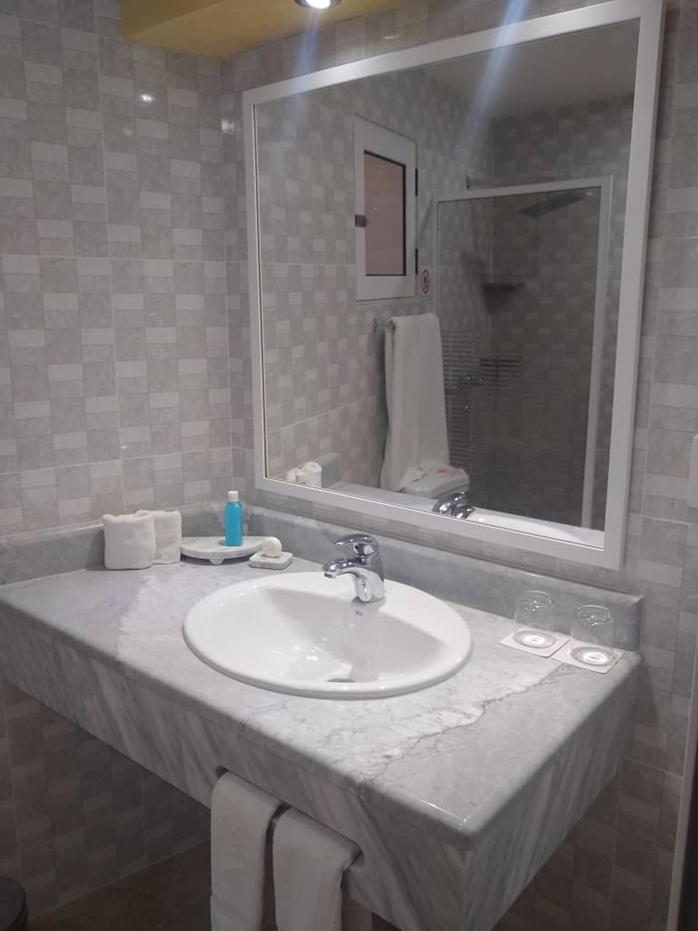 Standard Quadruple Room, 2 Double Beds, Non Smoking | Bathroom | Shower, bidet, towels