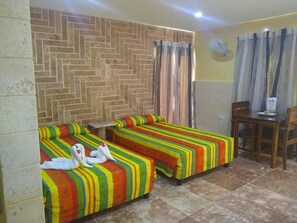 Standard Quadruple Room, 2 Double Beds, Non Smoking | Bed sheets - Hostal Los Mangos (Santa Marta)