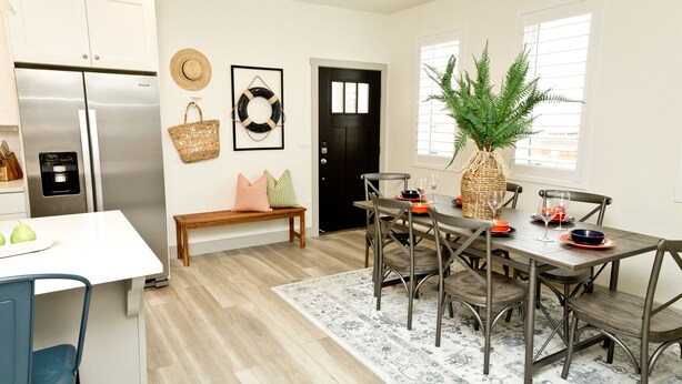 A modern kitchen with a built-in refrigerator, a dining table with chairs, and a bench. - ⛱️ O'hana Retreat ⛱️ Great Family Vacay | Spring Savings! (Washington)