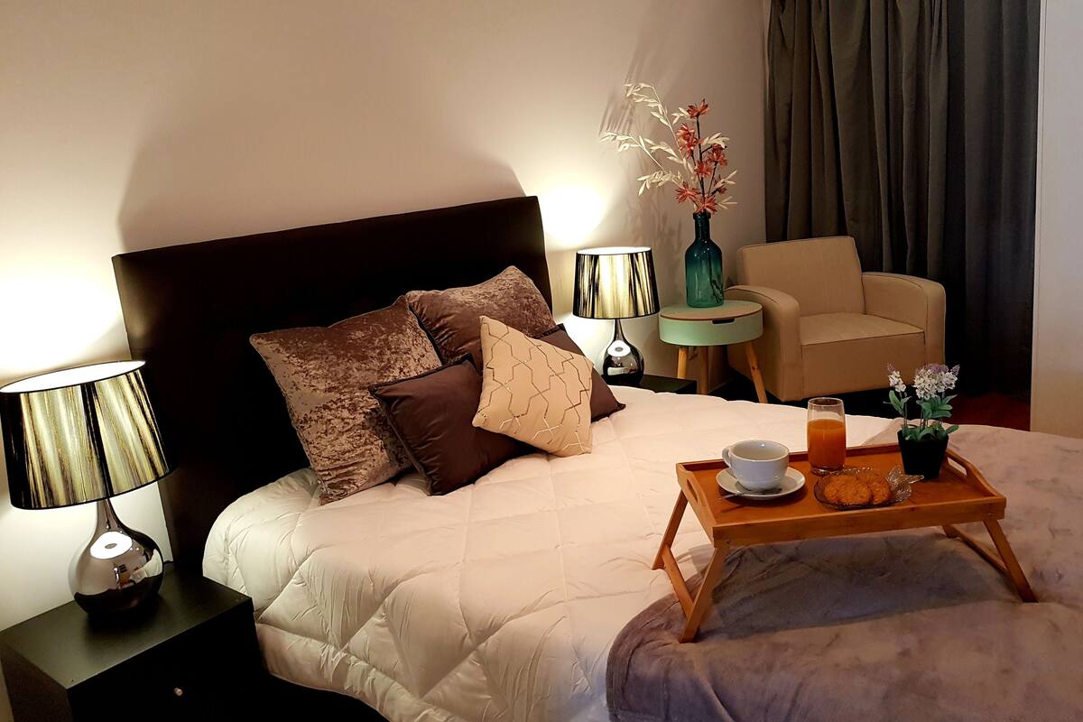 Blackout curtains, iron/ironing board, rollaway beds, free WiFi