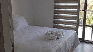 Desk, blackout curtains, soundproofing, iron/ironing board