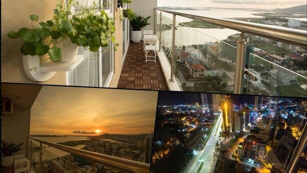 A balcony with potted plants, a view of the cityscape at sunset, and a nighttime city view. - Ha Long Pearl Apartment (Bai Chay)