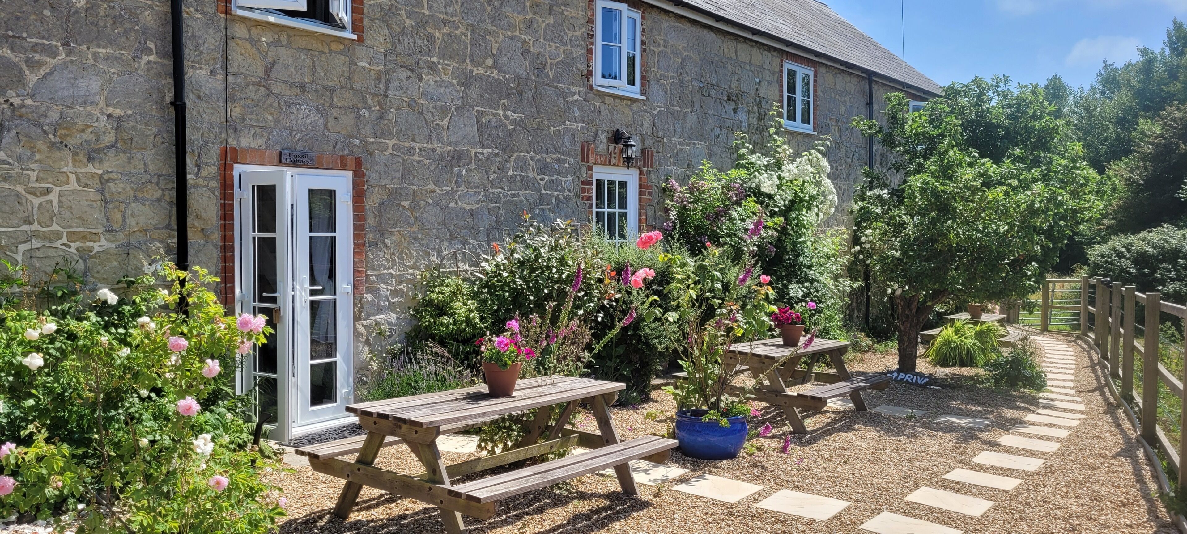 Stone cottage in idyllic location, surrounded by countryside, close to beaches.