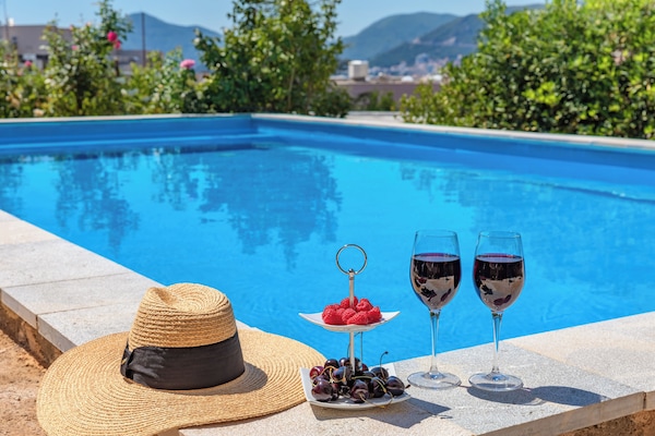 Seasonal outdoor pool, pool umbrellas, sun loungers