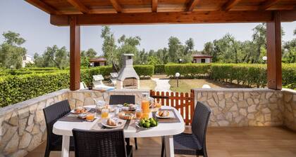Apartment "semi-detached Villa" for 5/6 person on the ground floor with separate entrances and with square meters 150 private Garden with Barbecue and Sunbeds