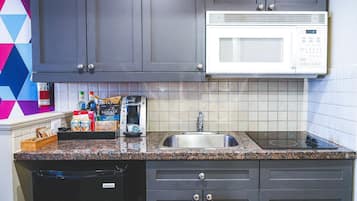 Microwave, stovetop, toaster, cookware/dishes/utensils