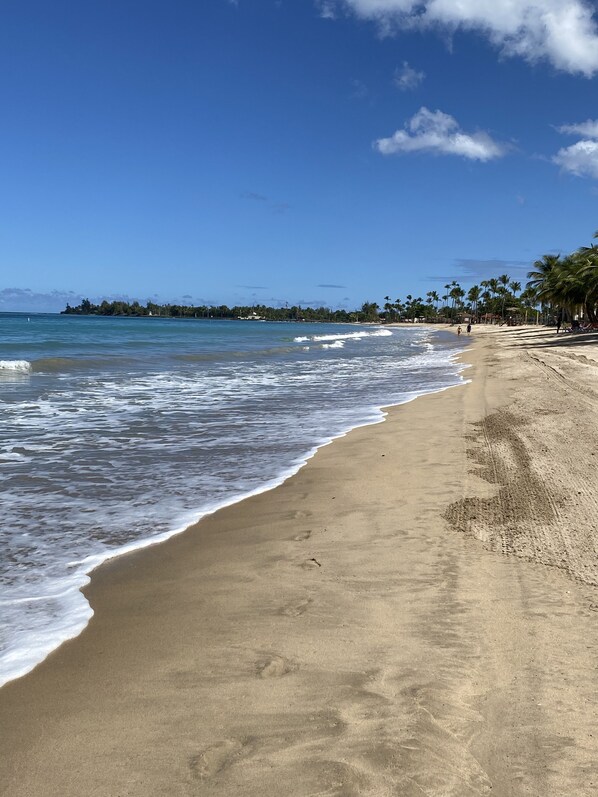 On the beach, sun loungers, beach towels