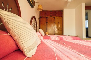 4 bedrooms, blackout curtains, iron/ironing board, rollaway beds