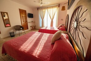 4 bedrooms, blackout curtains, iron/ironing board, rollaway beds