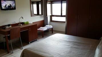 Business Triple Room, Accessible, Valley View | Desk, laptop workspace, blackout drapes, soundproofing