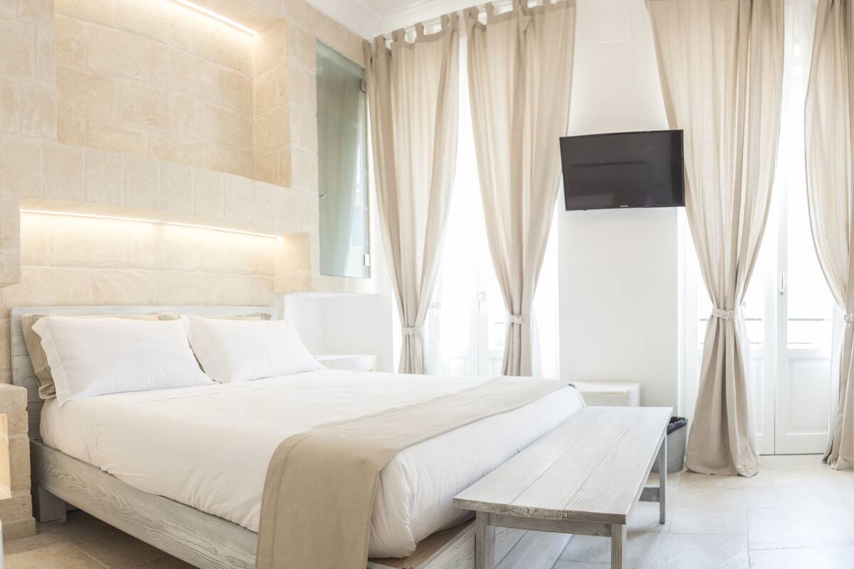 Premium bedding, down duvets, blackout curtains, soundproofing