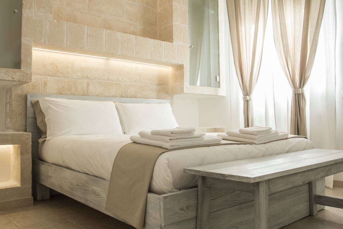 Premium bedding, down duvets, blackout curtains, soundproofing