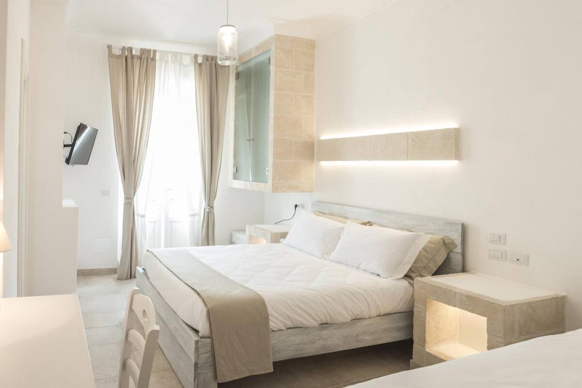 Premium bedding, down duvets, blackout curtains, soundproofing