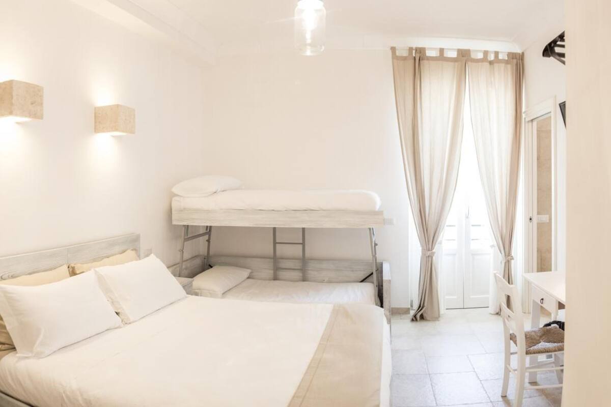 Premium bedding, down duvets, blackout curtains, soundproofing