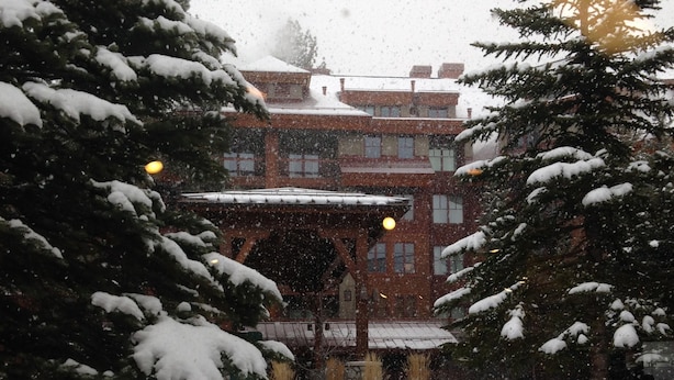 A building with a snow-covered roof and trees around it. - Spacious Room at The Marriott Grand Residence (South Lake Tahoe)