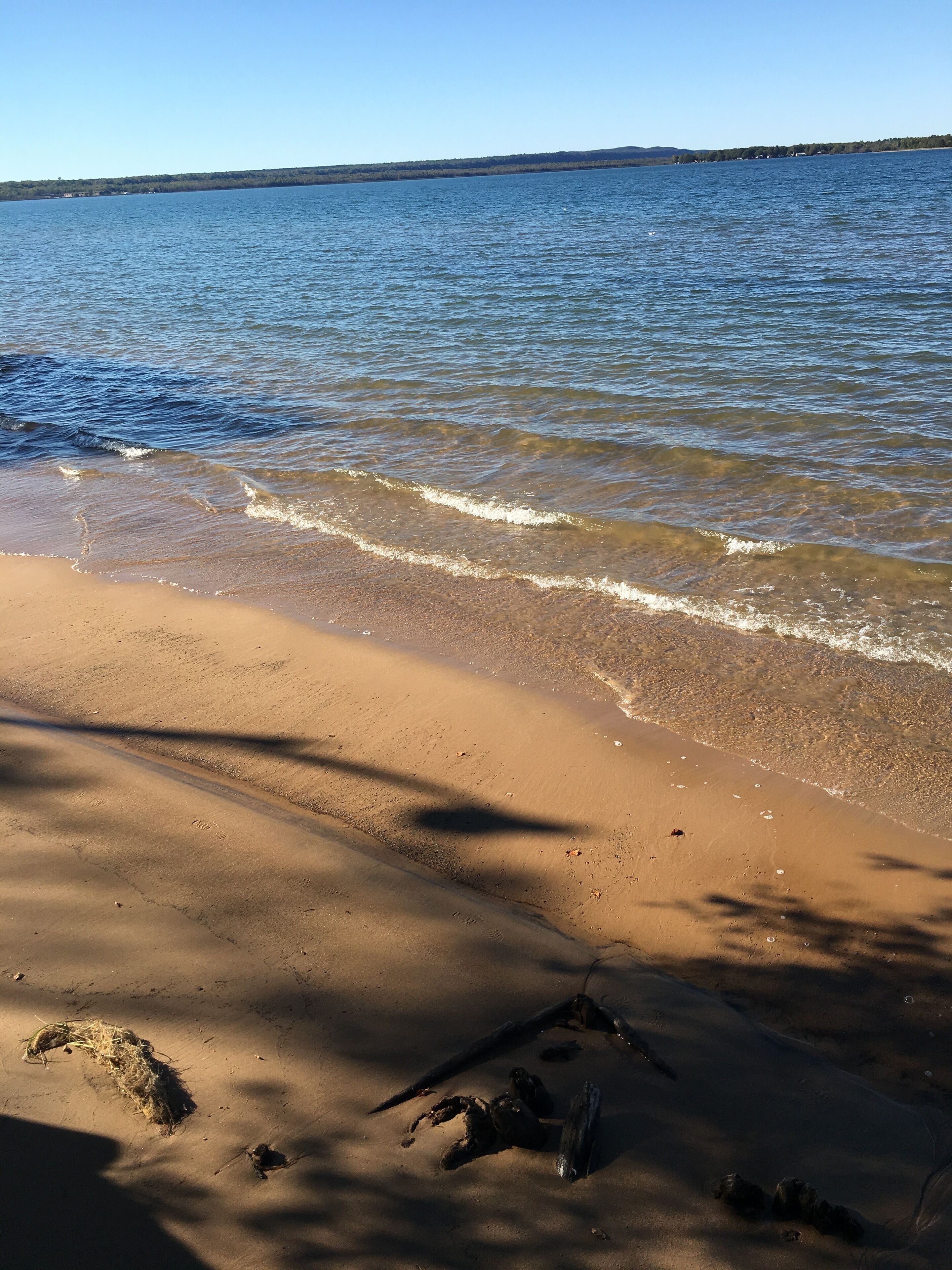 Rustic cozy cabin on a BEAUTIFUL bay of Lake Superior with prime beachfront.