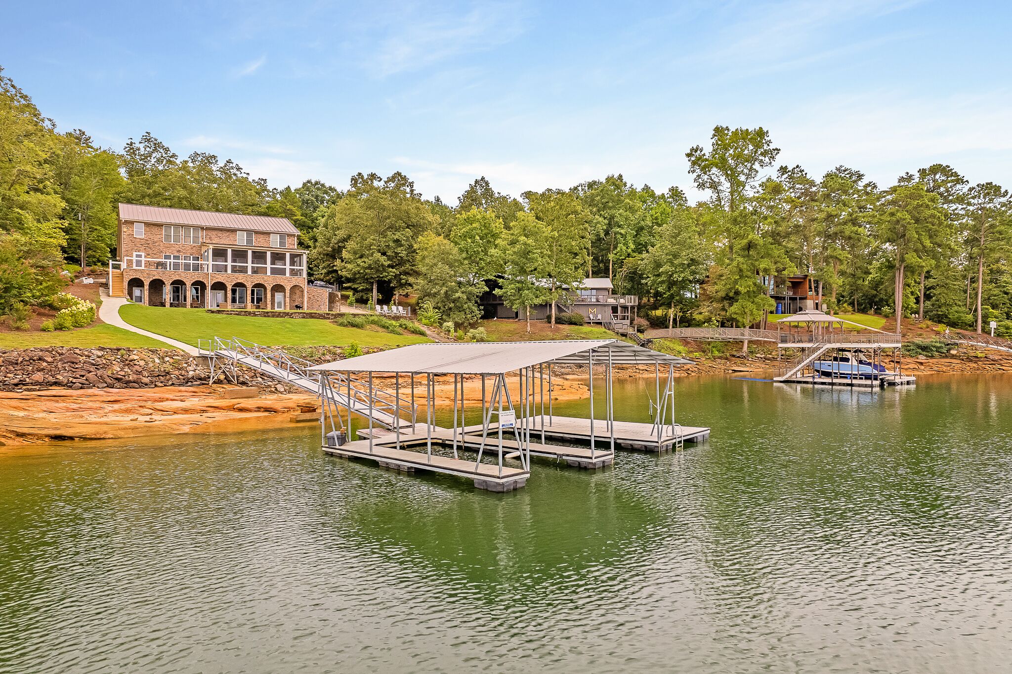 "Arches" - Artisan home on the main body of the lake - 2 covered boat slips