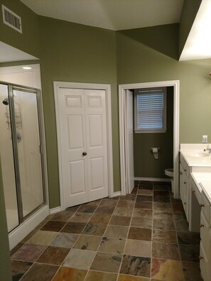 Shower, hair dryer, towels, toilet paper