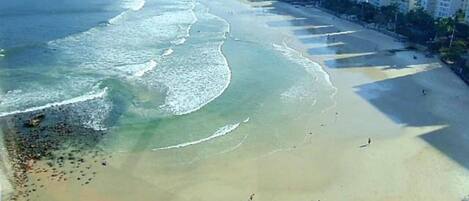 On the beach, sun-loungers
