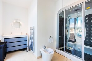 Douche, serviettes fournies