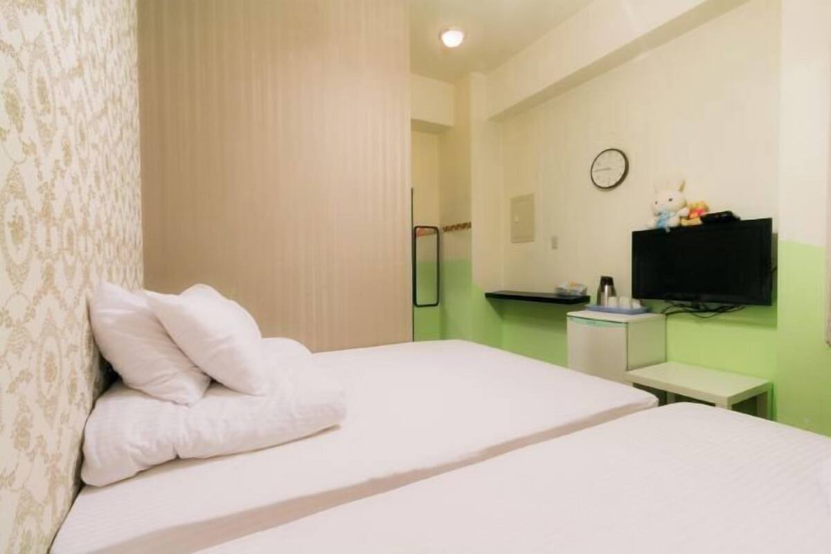 Individually decorated, individually furnished, desk, rollaway beds