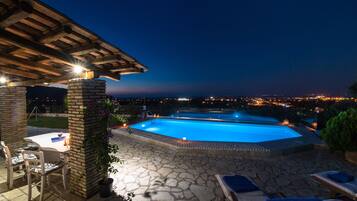2 outdoor pools, pool umbrellas, pool loungers