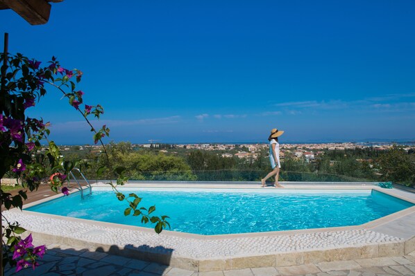 2 outdoor pools, pool umbrellas, pool loungers